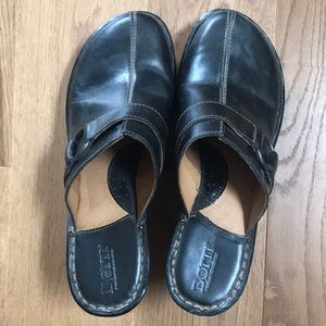 Black leather born clogs
